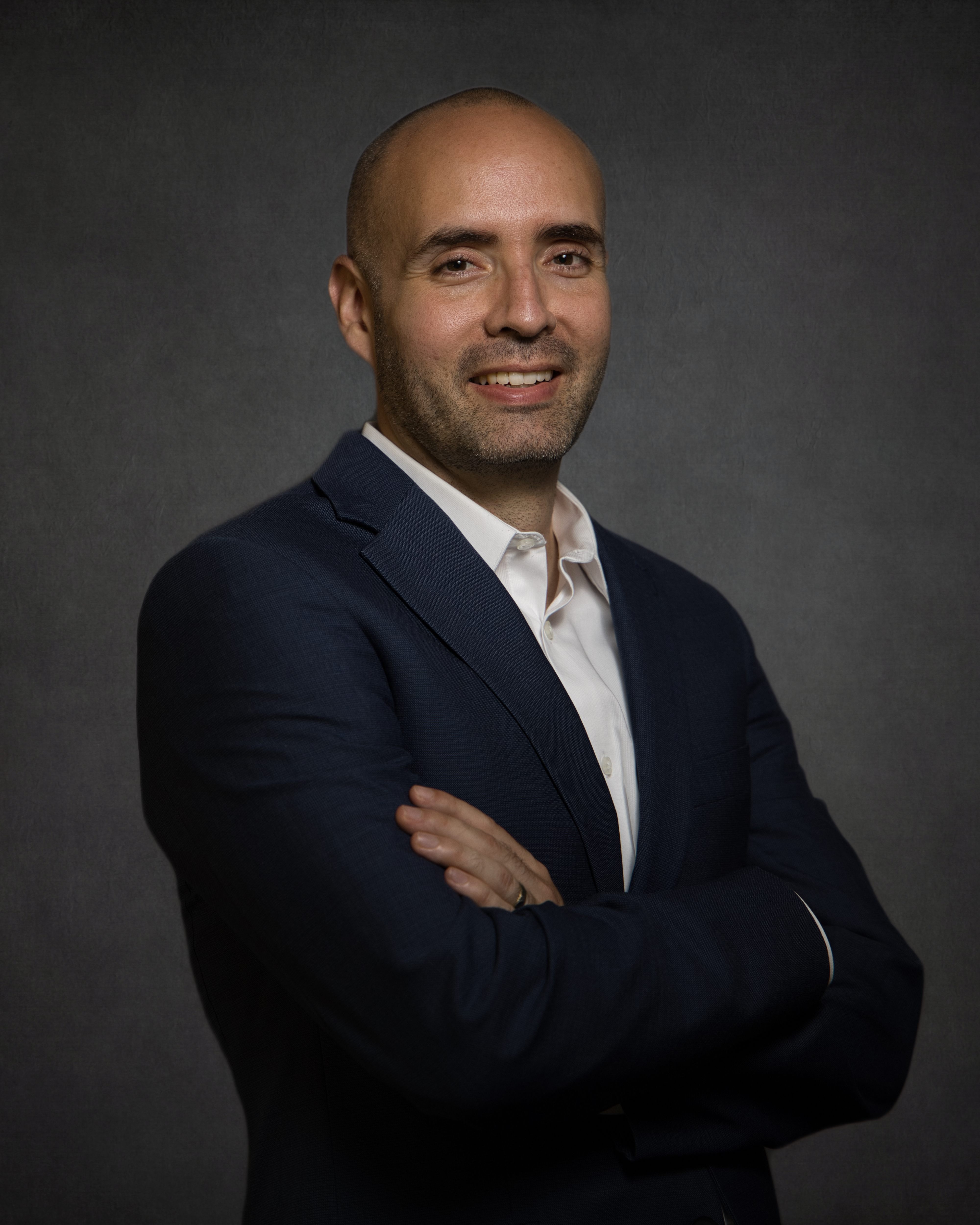 Professional headshot of Arrhen Knight